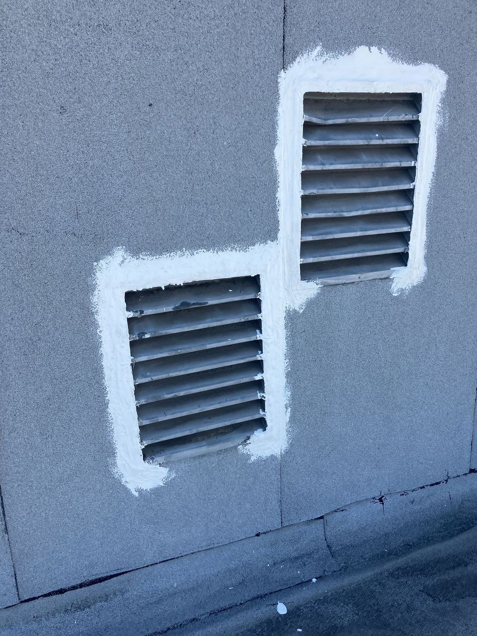 Louver vent flashing sealed on flat modified-bitumen roof