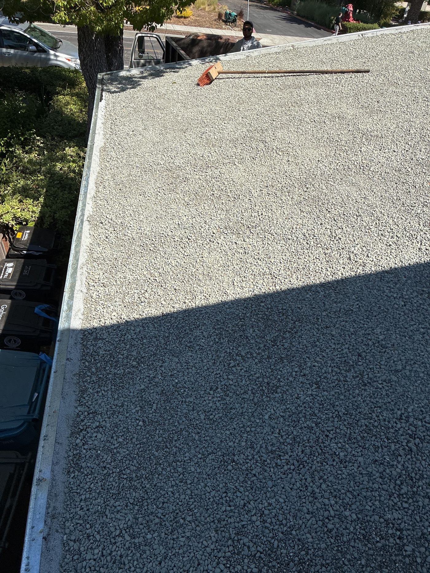 Gravel-surfaced BUR in mid-install on a San Jose commercial building
